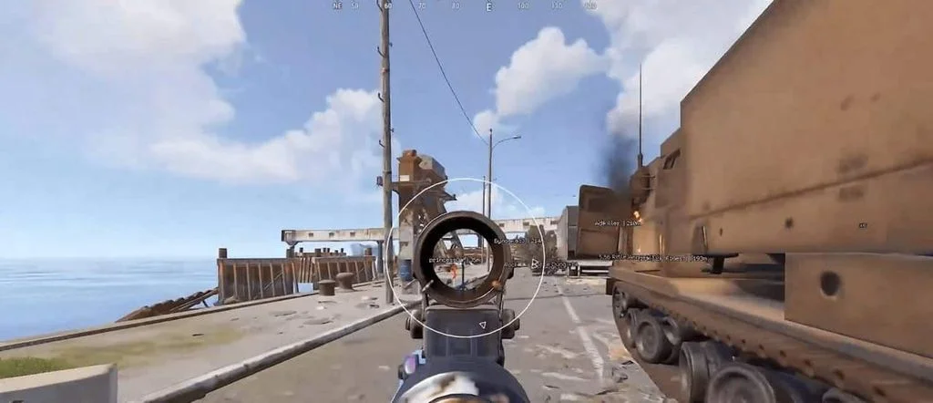 Rust aimbot scoped in at a monument with enemy ESP labels and the Bradley APC tagged